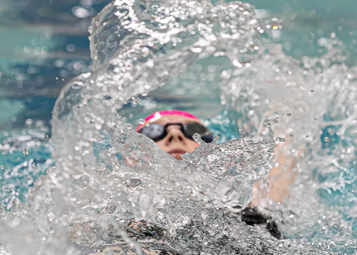 Girl swimming during a race
